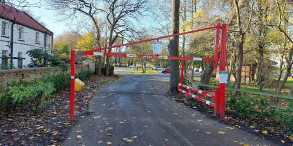 An image of the barrier at the entry to Bridge View Park in Barton