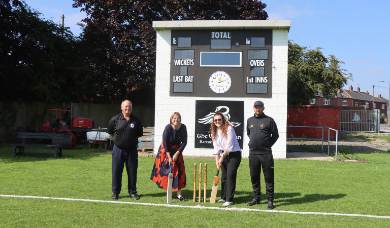 Image announcing Barton cricket club as fostering friendly members From Left to Right Andrew Tester, Club President. Julie Reed, Cabinet Member for Childrens and Families, Laurissa Reynolds Marketing and Communication officer for fostering, Paul Bell, Vice Chairman and 1st Team Player.