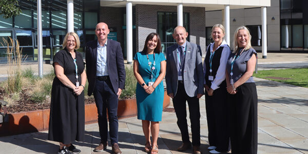 Pictured (l to r): Debbie Dobson, Cllr Rob Waltham, Helen Rose, Cllr Richard Hannigan, Victoria Lawrence, director adults and health and Alison Barker, chief executive stood outside Church Square House.