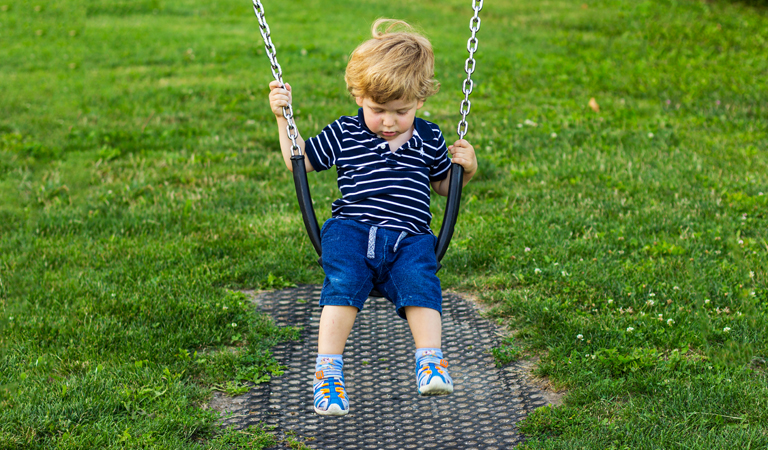Young child on a swing