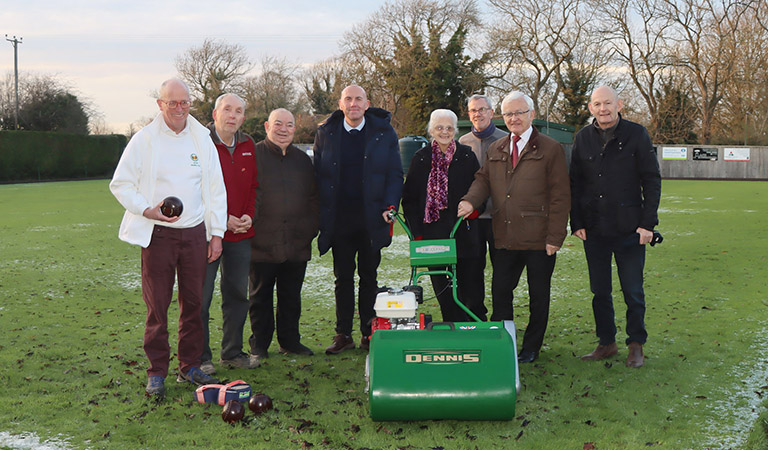 An picture of members of Goxhill Bowls Club with their new lawn mower, along with Cllr Rob Waltham, Martin Vickers MP, Cllr David Wells, Cllr Peter Clark, and Cllr Richard Hannigan.