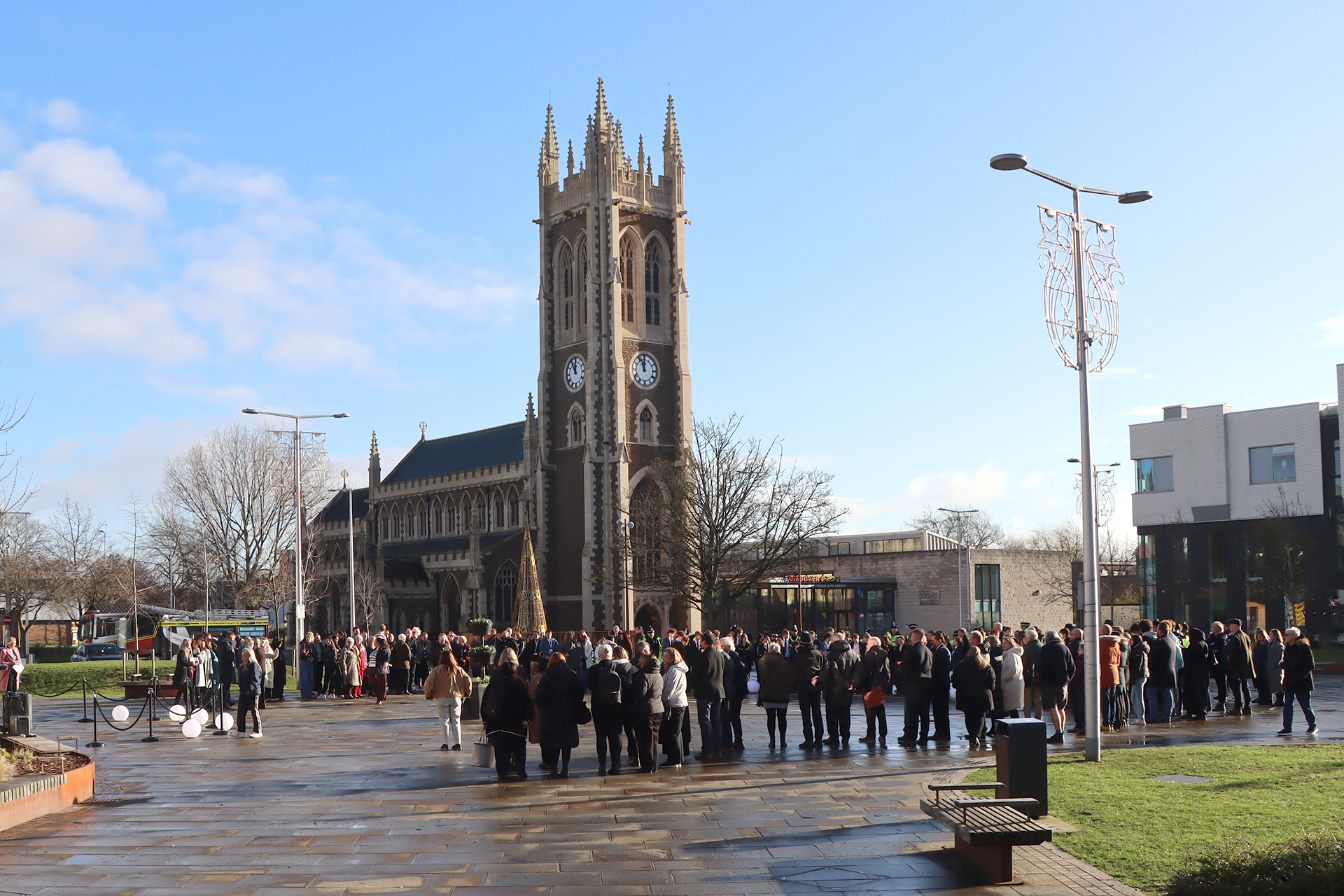 Crowd of people in Church Square for White Ribbon flag raising
