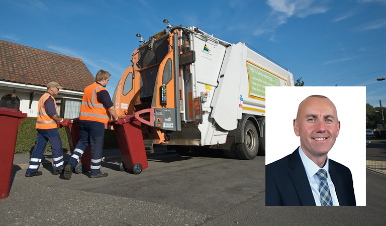 Bin wagon, burgundy bins and Cllr Rob Waltham.