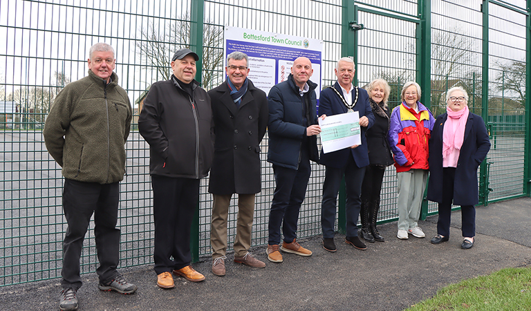 An image of a cheque being presented at Bottesford MUGA