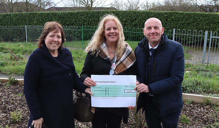 Cllr Waltham and Cllr Reed presenting a grant cheque to Volunteen